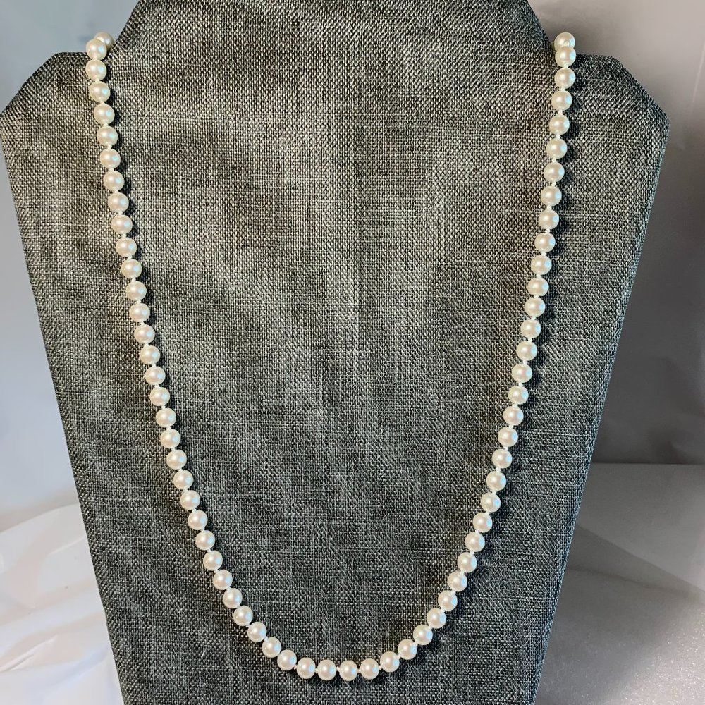 Carolee White Pearl Necklace. 24". (337)